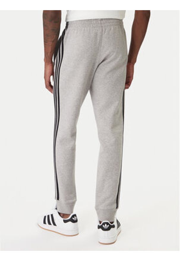 Adidas - adidas Spodnie dresowe 3-Stripes KE2428 Szary Slim Fit. Kolor: szary. Materiał: syntetyk