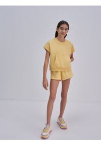 Big-Star - Koszulka dziewczęca z dresowej dzianiny żółta Esmelka 200. Kolor: żółty. Materiał: dresówka, dzianina. Styl: młodzieżowy, elegancki