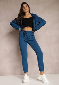 Renee - Ciemnoniebieskie Spodnie Dresowe z Tłoczeniem Alase. Okazja: na spotkanie biznesowe, na co dzień, na spacer. Kolor: niebieski. Materiał: dresówka. Styl: klasyczny, casual, biznesowy
