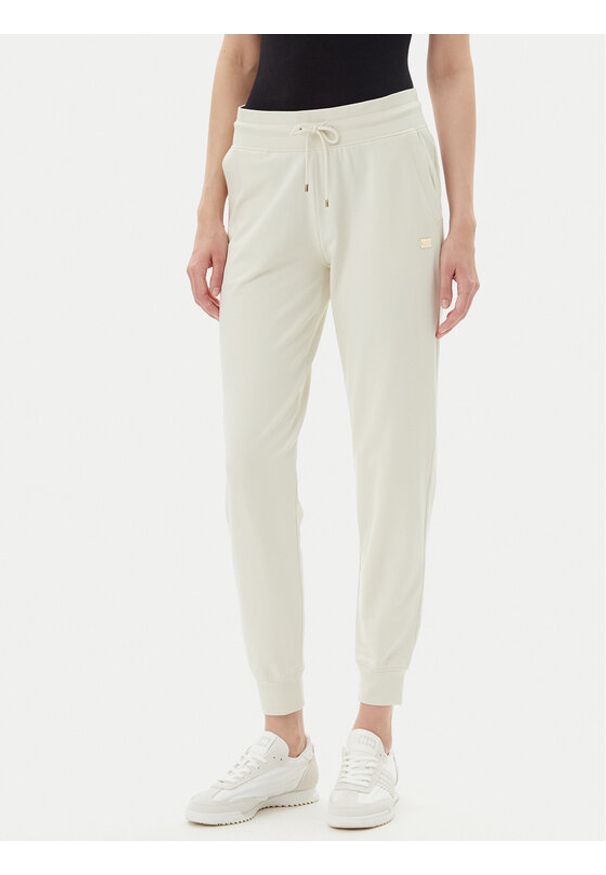 EA7 Emporio Armani Spodnie dresowe 7W000082 AF13135 U1112 Beżowy Regular Fit. Kolor: beżowy. Materiał: bawełna