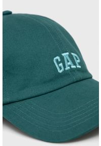 GAP czapka bawełniana kolor zielony gładka. Kolor: zielony. Materiał: bawełna. Wzór: gładki