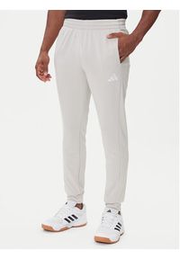 Adidas - adidas Dres Basic 3-Stripes JX5519 Beżowy Regular Fit. Kolor: beżowy. Materiał: syntetyk