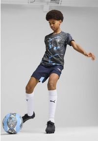 Puma - Młodzieżowa koszulka przedmeczowa Manchester City PUMA Strong Gray Cool Light. Kolor: szary