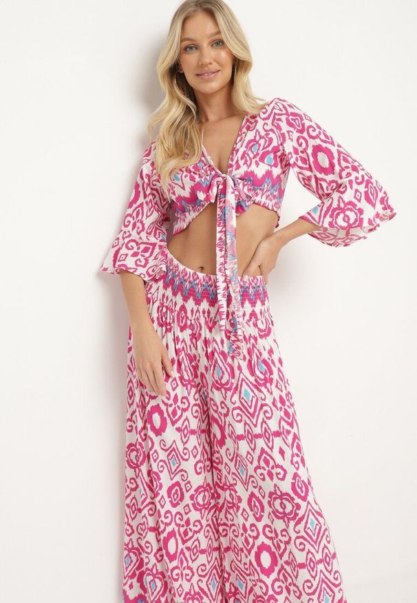 Born2be - Fuksjowy Bawełniany Komplet Kopertowy Top z Wiązaniem Szerokie Spodnie z Gumką w Pasie Viknie. Kolor: różowy. Materiał: bawełna