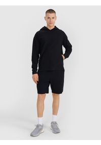 4f - 4F Bluza dresowa nierozpinana z kapturem męska - czarna XXL. Okazja: na co dzień. Typ kołnierza: kaptur. Kolor: czarny. Materiał: dresówka. Długość rękawa: raglanowy rękaw. Wzór: aplikacja, ze splotem. Styl: sportowy, elegancki, casual