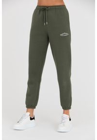 Juicy Couture - JUICY COUTURE Zielone spodnie dresowe Recycled Wendy Jogger. Kolor: zielony. Materiał: dresówka