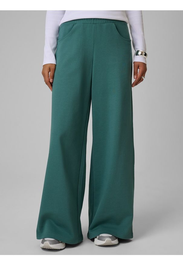 4f - 4F Spodnie dresowe z szerokimi nogawkami damskie - turkusowe XS. Kolor: turkusowy. Materiał: dresówka. Sport: bieganie, turystyka piesza