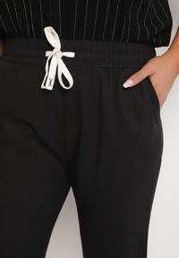 Born2be - Czarne Spodnie z Bawełny z Wysokim Stanem i Wiązaniem Lirassia. Okazja: na co dzień. Stan: podwyższony. Kolor: czarny. Materiał: bawełna. Styl: casual #3