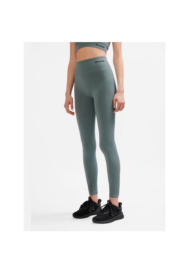 Legginsy sportowe dla kobiet Hummel. Stan: podwyższony. Kolor: wielokolorowy, szary, zielony. Materiał: poliamid. Sport: fitness