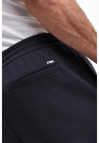 Emporio Armani - Spodnie dresowe męskie EMPORIO ARMANI. Materiał: dresówka