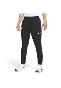 Spodnie Nike Dri-Fit CZ6379-010 - czarne. Kolor: czarny. Materiał: dresówka, poliester, bawełna. Technologia: Dri-Fit (Nike)