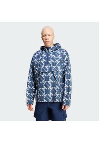Adidas - Wiatrówka Manchester United Seasonal Half-Zip. Kolor: niebieski, czarny, wielokolorowy. Materiał: materiał. Sport: piłka nożna