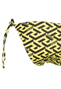 VERSACE - Żółty dół od bikini z logowaniem. Kolor: żółty. Materiał: materiał