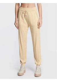 United Colors of Benetton - United Colors Of Benetton Spodnie dresowe 113CDF004 Beżowy Relaxed Fit. Kolor: beżowy. Materiał: bawełna