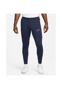 Spodnie sportowe męskie Nike DF Academy 23. Kolor: niebieski, wielokolorowy, biały. Materiał: syntetyk, materiał. Długość: długie #1