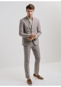 Ochnik - Beżowe spodnie garniturowe męskie. Kolor: beżowy. Materiał: bawełna