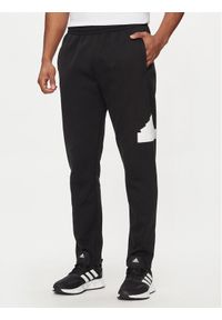 Adidas - adidas Spodnie dresowe Future Icons IN3322 Czarny Regular Fit. Kolor: czarny. Materiał: syntetyk