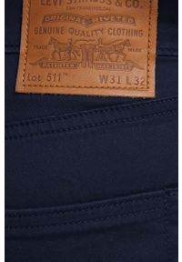 Levi's® - Levi's spodnie 511 męskie kolor granatowy proste. Okazja: na spotkanie biznesowe. Kolor: niebieski. Materiał: tkanina, bawełna. Wzór: gładki. Styl: biznesowy