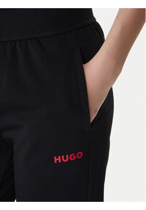 Hugo - HUGO Spodnie dresowe 50556326 Czarny Regular Fit. Kolor: czarny. Materiał: bawełna