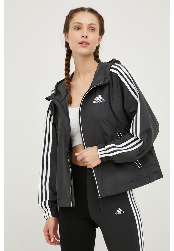 adidas Performance kurtka damska kolor czarny przejściowa oversize. Kolor: czarny. Materiał: materiał