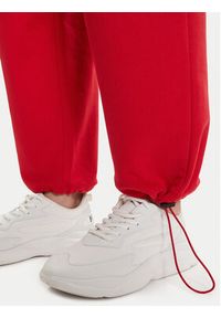Hugo - HUGO Spodnie dresowe Norata_B 50542564 Czerwony Baggy Fit. Kolor: czerwony. Materiał: bawełna #4