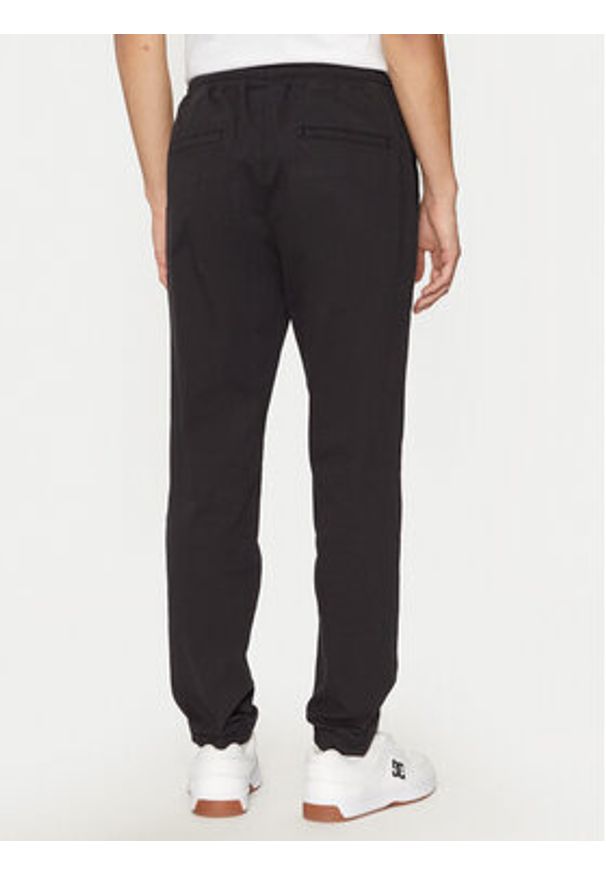 Champion Joggery 220518 Czarny Regular Fit. Kolor: czarny. Materiał: bawełna