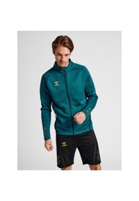 Bluza dresowa zapinana na zamek błyskawiczny Hummel Cima XK. Kolor: niebieski. Materiał: dresówka. Wzór: nadruk