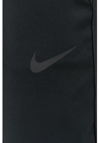 Nike - Spodnie. Kolor: czarny. Materiał: tkanina, skóra, włókno. Technologia: Dri-Fit (Nike) #3