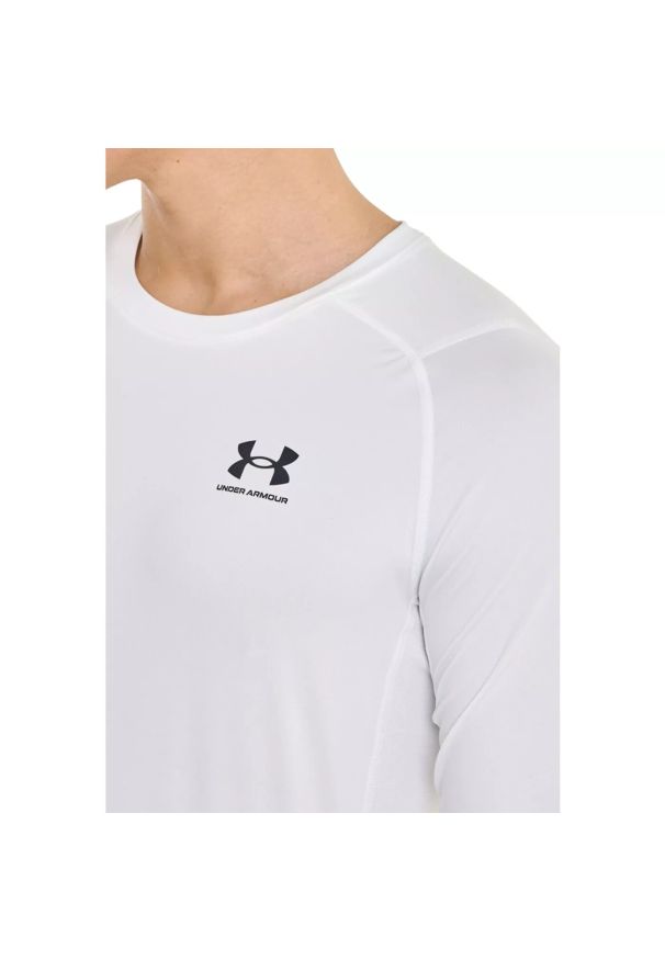 Under Armour - Longsleeve treningowy męski UNDER ARMOUR UA HG ARMOUR COMP LS. Kolor: biały. Materiał: tkanina, materiał. Długość rękawa: długi rękaw