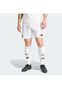 Adidas - Szorty Real Madrid 24/25 Home. Kolor: biały. Materiał: materiał. Sport: piłka nożna