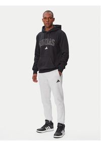 Adidas - adidas Spodnie dresowe Essentials Feelcozy Fleece JE3819 Szary jasny Regular Fit. Kolor: szary. Materiał: bawełna #2