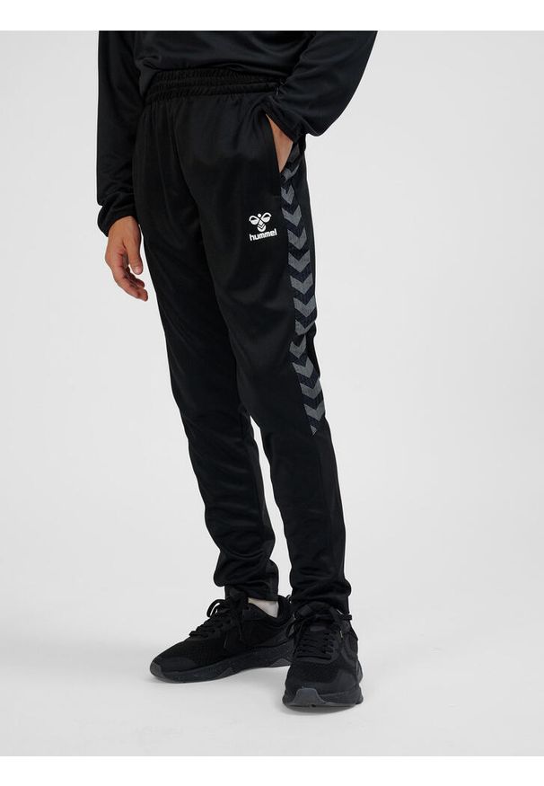 Hummel spodnie dziecięce sportowe dresowe Authentic Training Pants. Kolor: czarny. Materiał: dresówka. Sport: joga i pilates