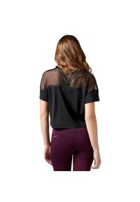 Koszulka sportowa damska Reebok Cardio Fashion Top. Kolor: czarny. Długość rękawa: krótki rękaw. Długość: krótkie