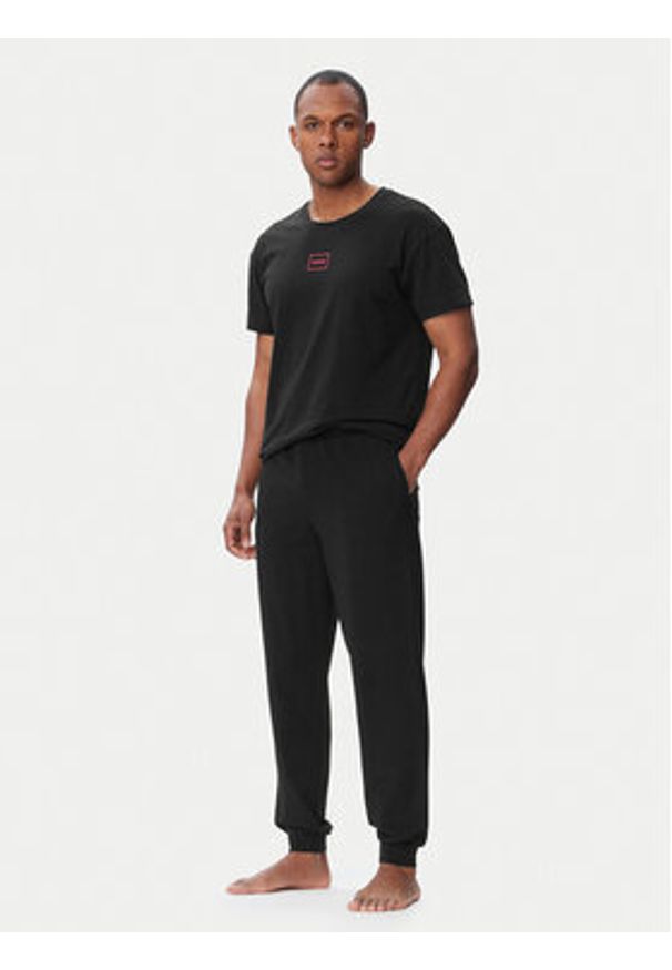 Hugo - HUGO Spodnie piżamowe 50575186 Czarny Slim Fit. Kolor: czarny. Materiał: bawełna