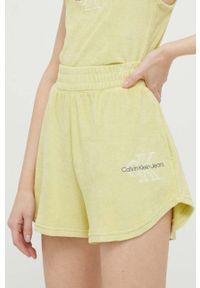 Calvin Klein Jeans szorty damskie kolor zielony z nadrukiem high waist. Stan: podwyższony. Kolor: zielony. Materiał: dzianina. Wzór: nadruk