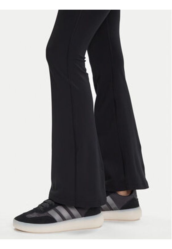 Adidas - adidas Legginsy All Me Essentials JW7667 Czarny Flare Fit. Kolor: czarny. Materiał: syntetyk