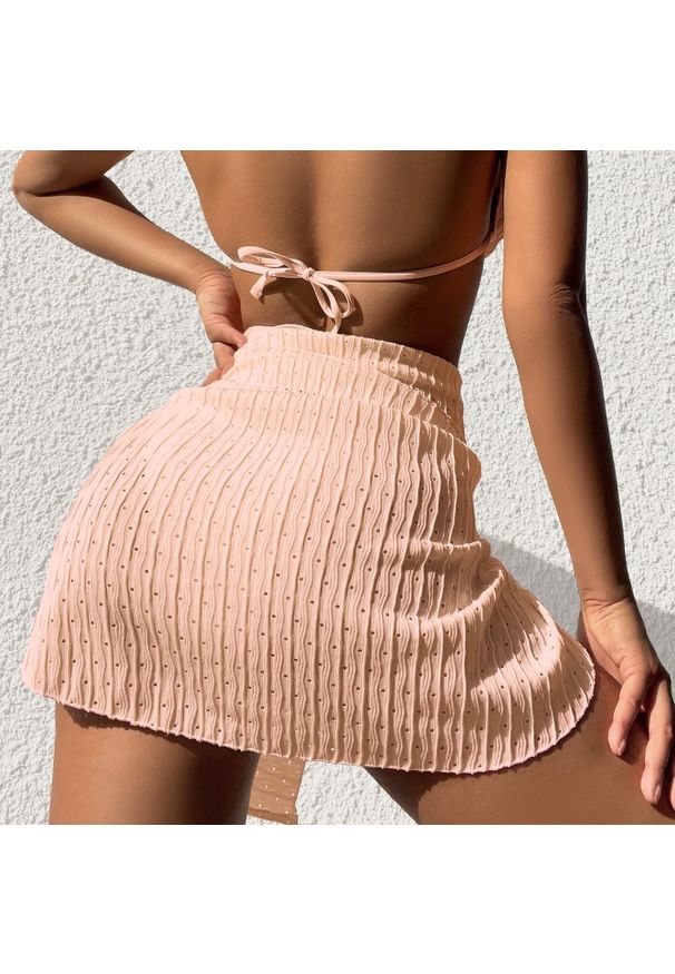 Intica - Bikini wiązane na szyi z elastyczną spódnicą plażową Erietta. Kolor: różowy. Materiał: materiał
