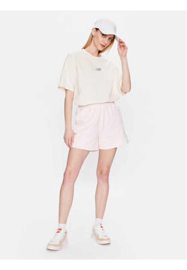 New Balance T-Shirt WT31511 Beżowy Oversize. Kolor: beżowy. Materiał: bawełna