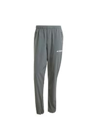 Adidas - Spodnie Multi Essentials Stretch. Kolor: zielony. Materiał: materiał. Sezon: lato. Sport: turystyka piesza