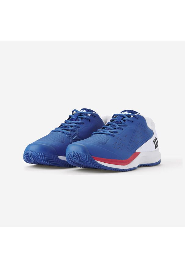 Buty tenisowe męskie Wilson Rush Pro Ace na mączkę ceglaną. Kolor: czerwony, niebieski, wielokolorowy, biały. Materiał: tkanina, mesh, kauczuk. Szerokość cholewki: normalna. Sport: tenis