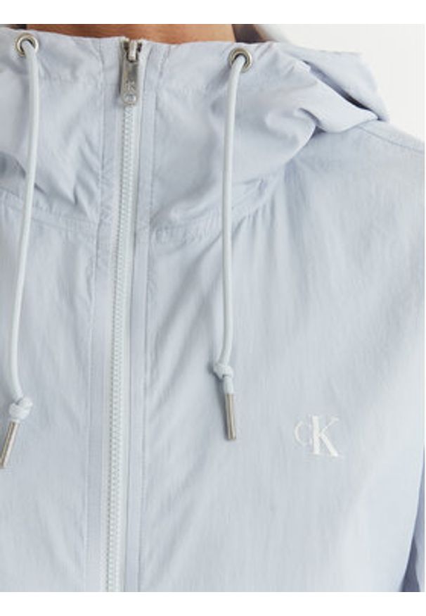 Calvin Klein Jeans Wiatrówka Essential LV047F507G Błękitny Regular Fit. Kolor: niebieski. Materiał: syntetyk