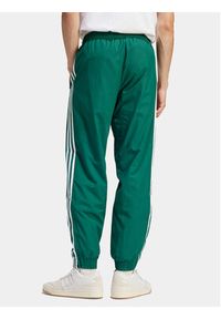 Adidas - adidas Spodnie dresowe Adicolor Woven Firebird IT2497 Zielony Regular Fit. Kolor: zielony. Materiał: syntetyk #4
