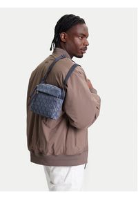 Calvin Klein Saszetka Slouched Monogram Mini Zip Fligh LV04G3175G Błękitny. Kolor: niebieski. Materiał: materiał #5