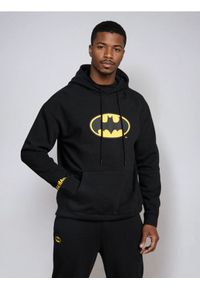 Sinsay - Bluza hoodie z nadrukiem Batman - czarny. Kolor: czarny. Wzór: motyw z bajki, nadruk #1