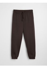 Sinsay - Spodnie dresowe ze ściągaczami - brązowy. Kolor: brązowy. Materiał: dresówka