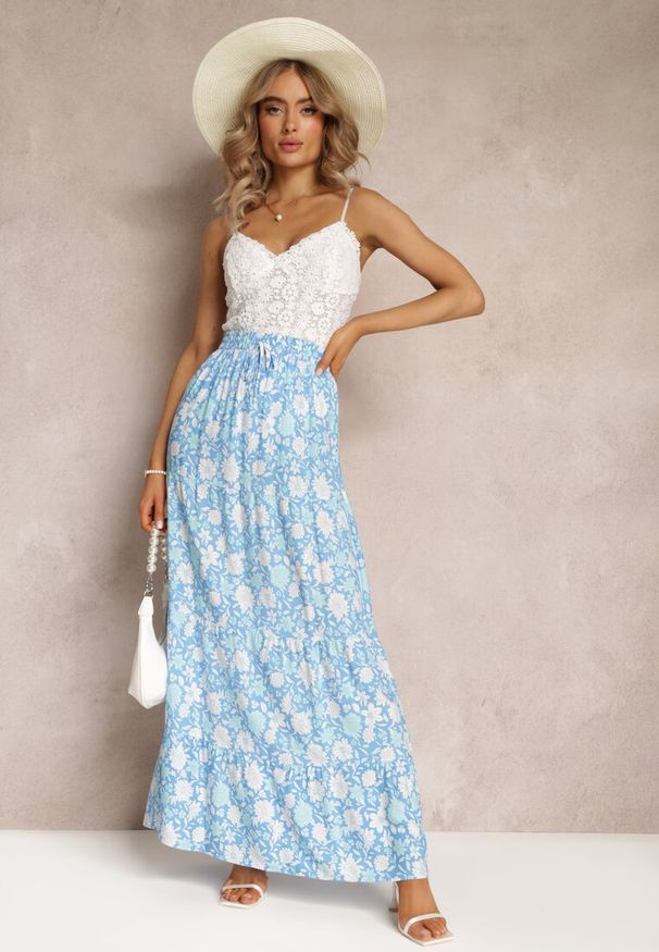 Renee - Niebieska Bawełniana Spódnica Maxi w Kwiaty Eile. Kolor: niebieski. Materiał: bawełna. Wzór: kwiaty