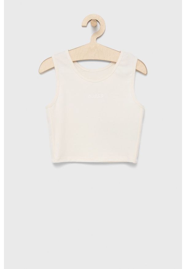Guess top dziecięcy kolor beżowy. Kolor: beżowy. Materiał: włókno, dzianina, materiał. Długość rękawa: na ramiączkach