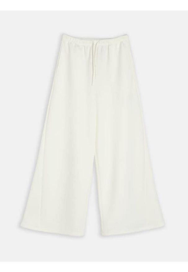 Sinsay - Spodnie dresowe wide leg - kremowy. Kolor: kremowy. Materiał: dresówka