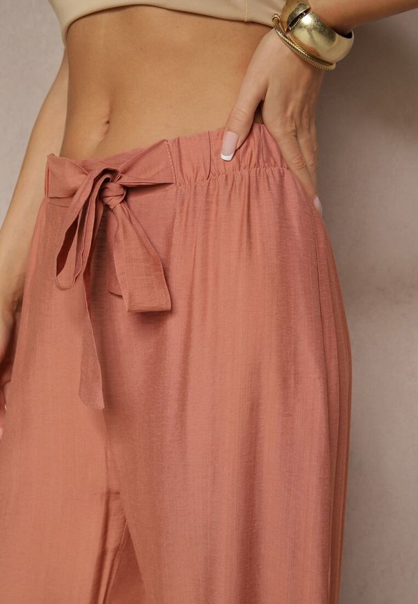 Renee - Pomarańczowe Spodnie z Wiskozy o Szerokim Kroju z Kokardą Ellioria. Okazja: na co dzień, na spacer. Kolor: pomarańczowy. Materiał: wiskoza. Styl: elegancki, casual