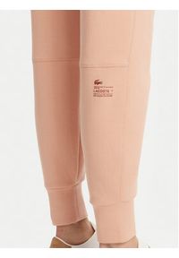 Lacoste Spodnie dresowe XF0343 Pomarańczowy Regular Fit. Kolor: pomarańczowy. Materiał: bawełna
